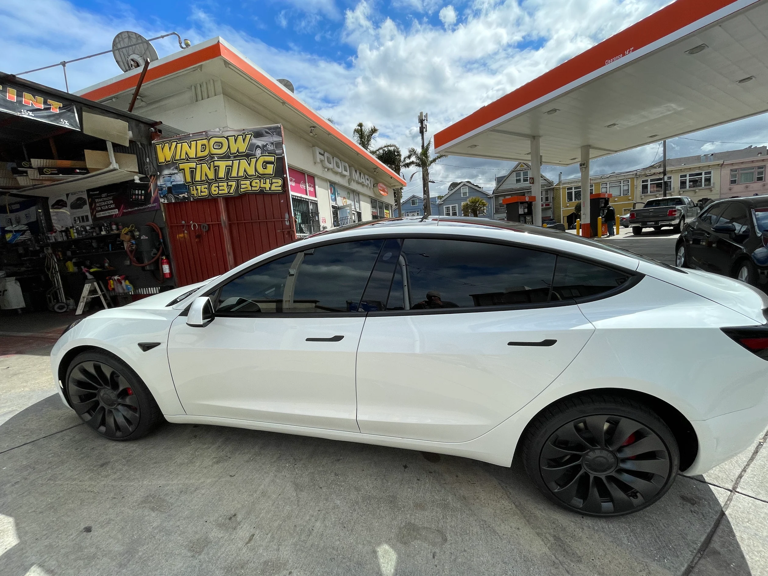 Silver Acura inside the North Bay Window Tint and Audio shop after window tint service