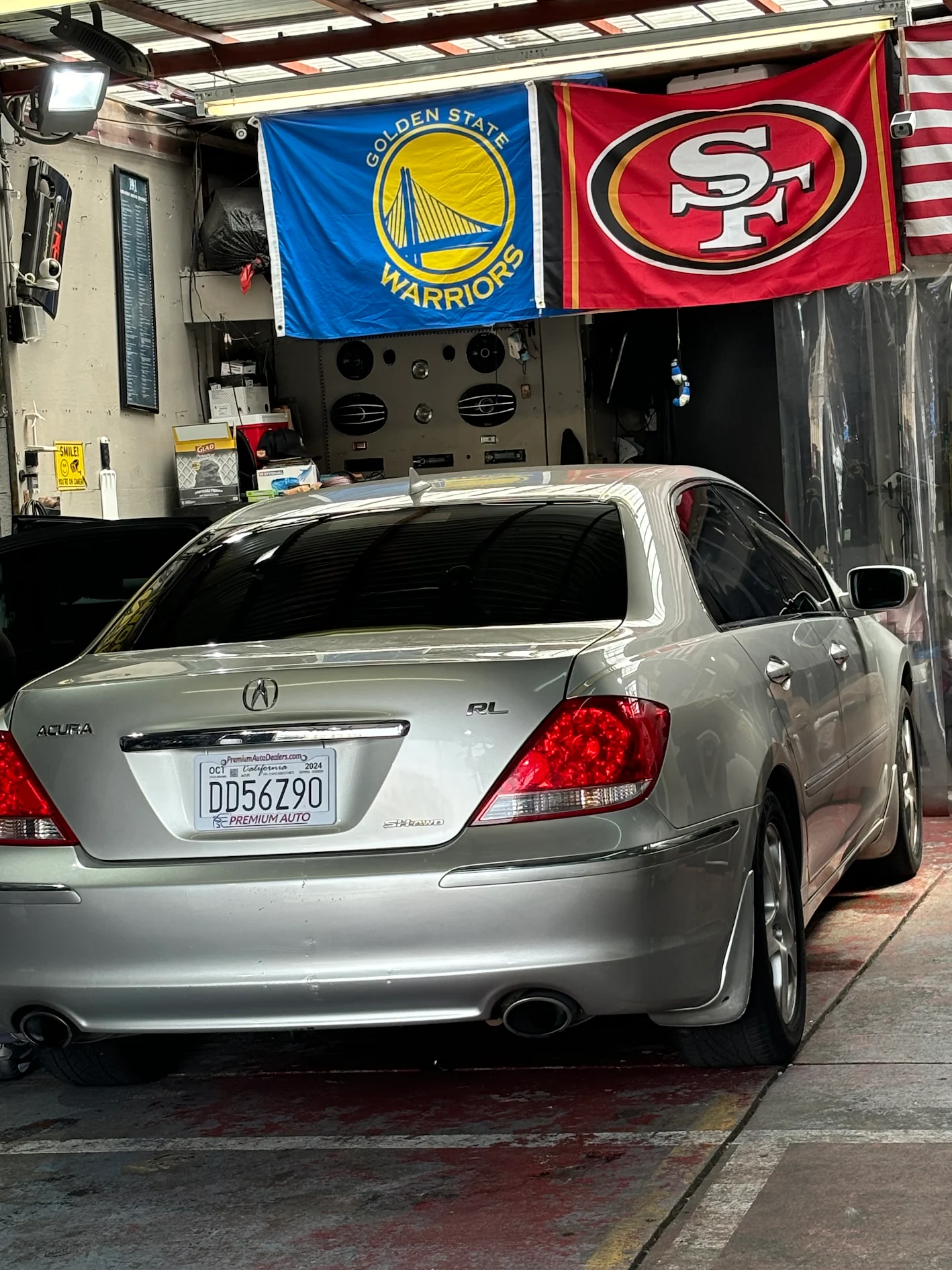 White Tesla with dark window tint outside North Bay Window Tint and Audio in San Francisco
